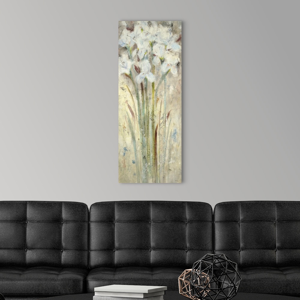 A modern room featuring A contemporary painting of white flowers.