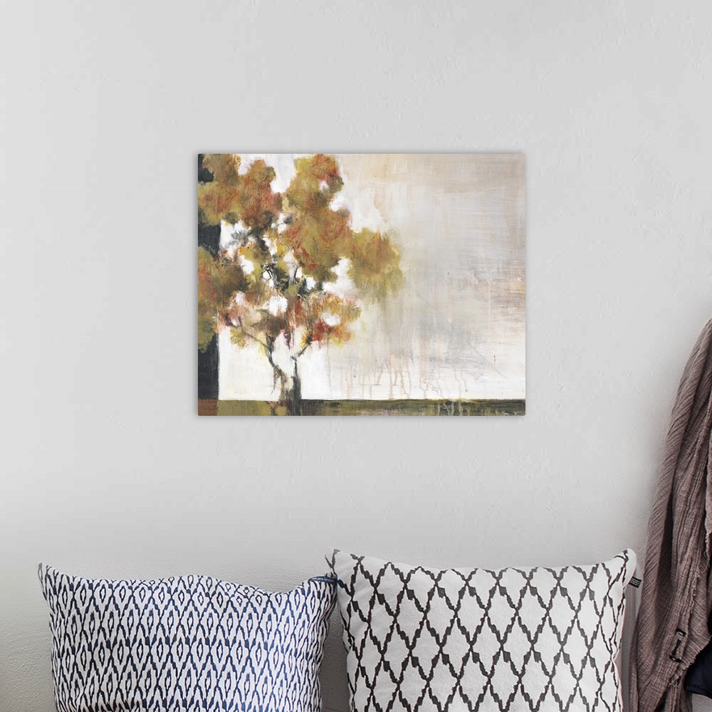 A bohemian room featuring Contemporary painting of a lone tree using earth tones and weathered textures.
