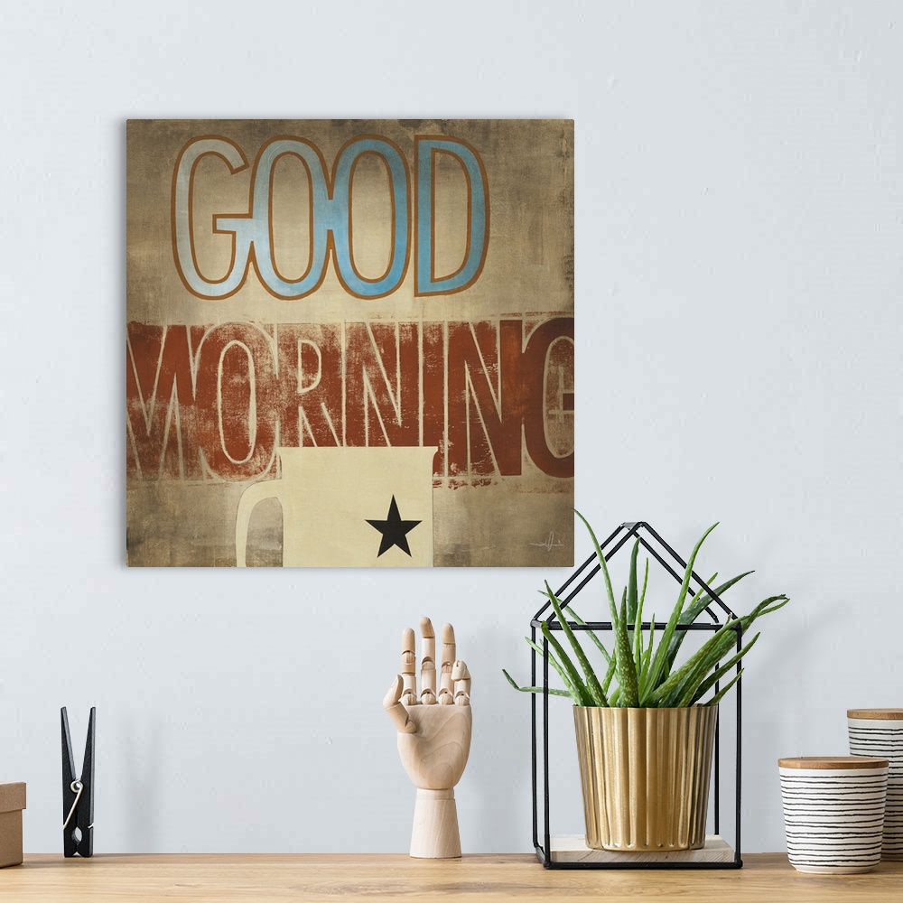 A bohemian room featuring Decorative artwork of a cup of coffee with the text "Good Morning" in rustic browns and blue.