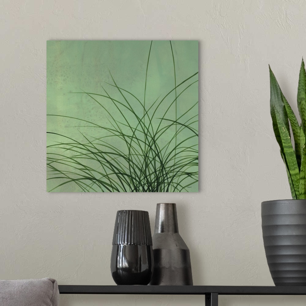A modern room featuring Square artwork with long, thin, green grass blades on a lighter green background.