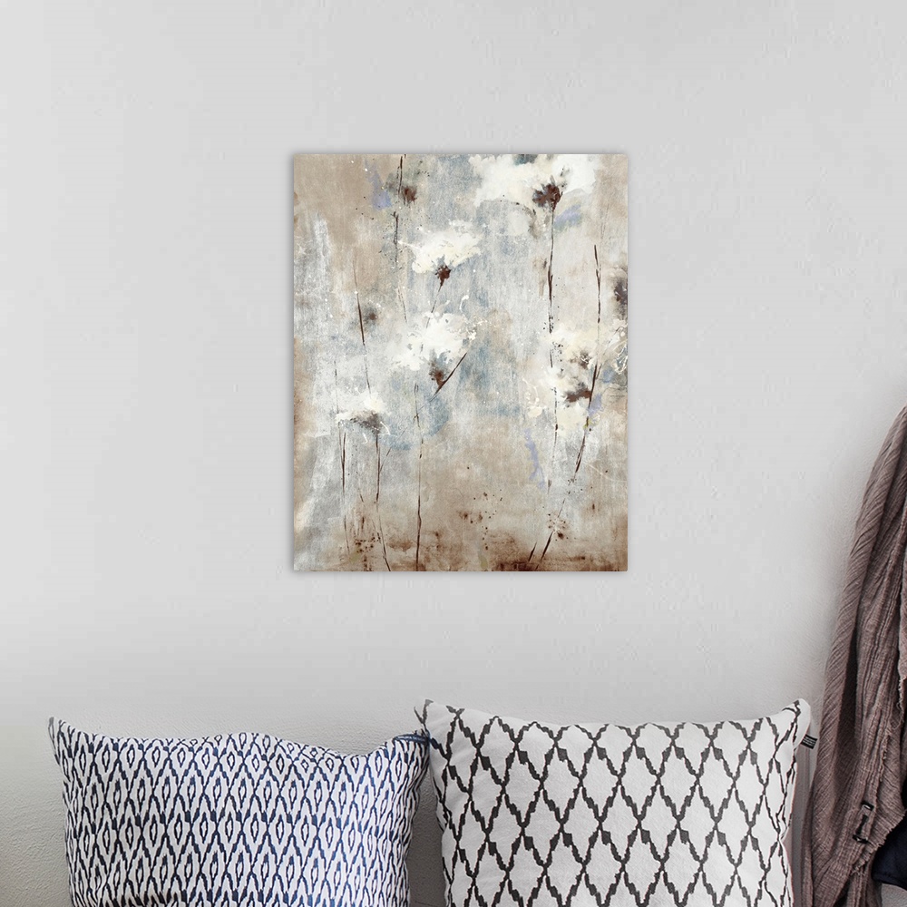 A bohemian room featuring A soft, contemporary painting of whispy white flowers on a neutral background with blue tones