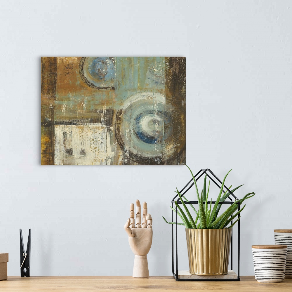 A bohemian room featuring Contemporary abstract painting using geometric shapes and muted colors.
