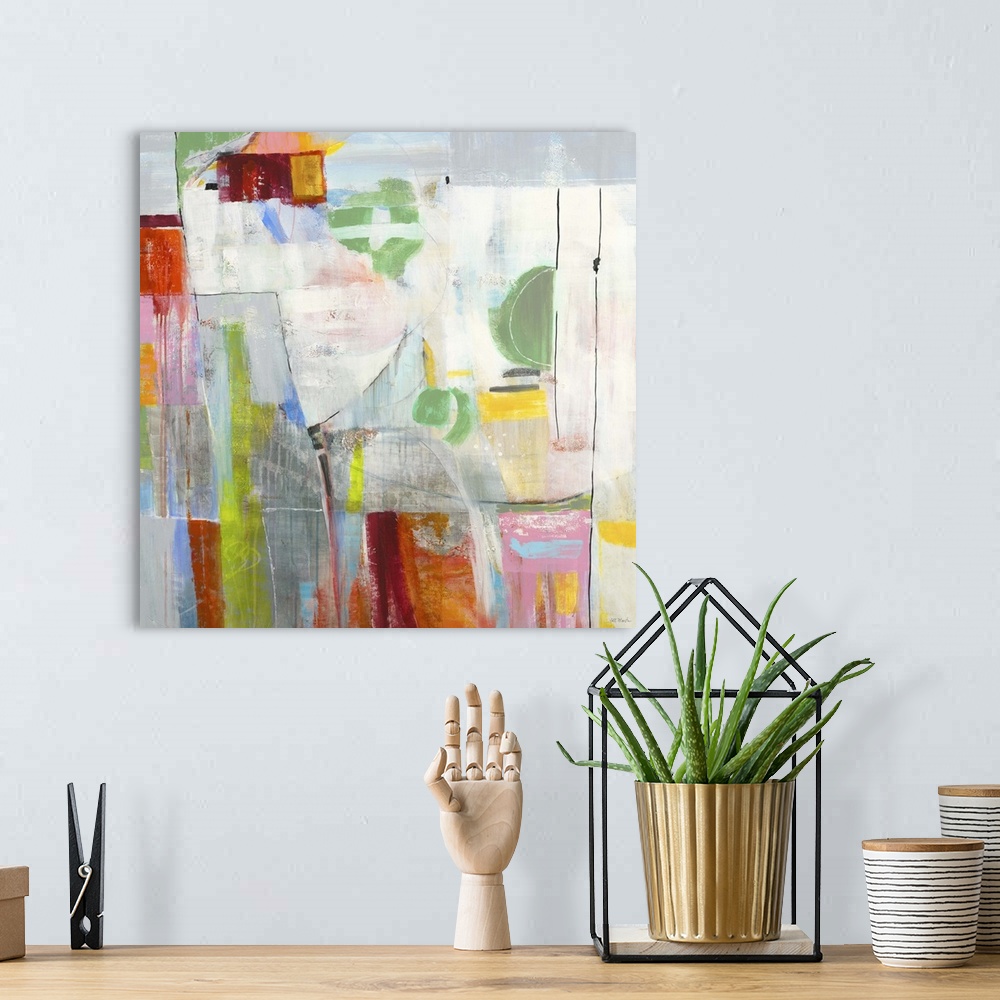 A bohemian room featuring Contemporary abstract painting using vibrant colors and geometric shapes.