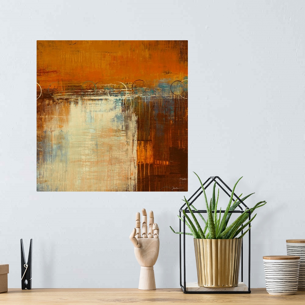 A bohemian room featuring Square, abstract painting in warm earth tones of patchy, layered colors with small drips running ...
