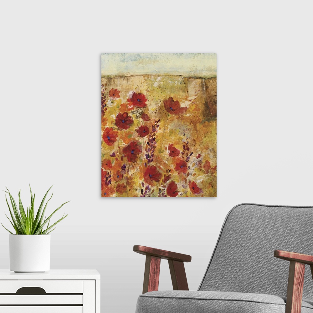 A modern room featuring A contemporary painting of red flowers in an empty field.