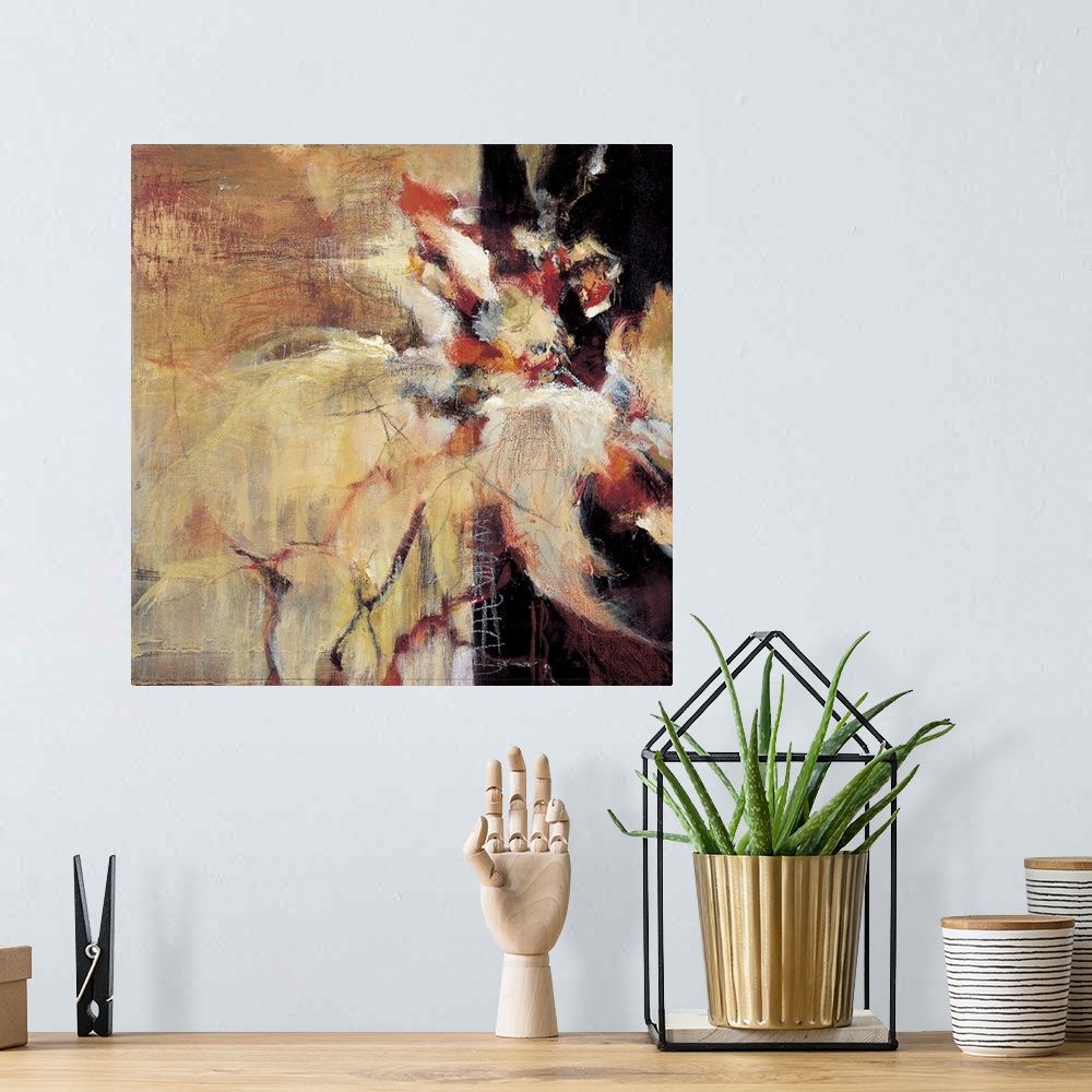 A bohemian room featuring Warm tones and rough looking textures give this abstract painting depth.