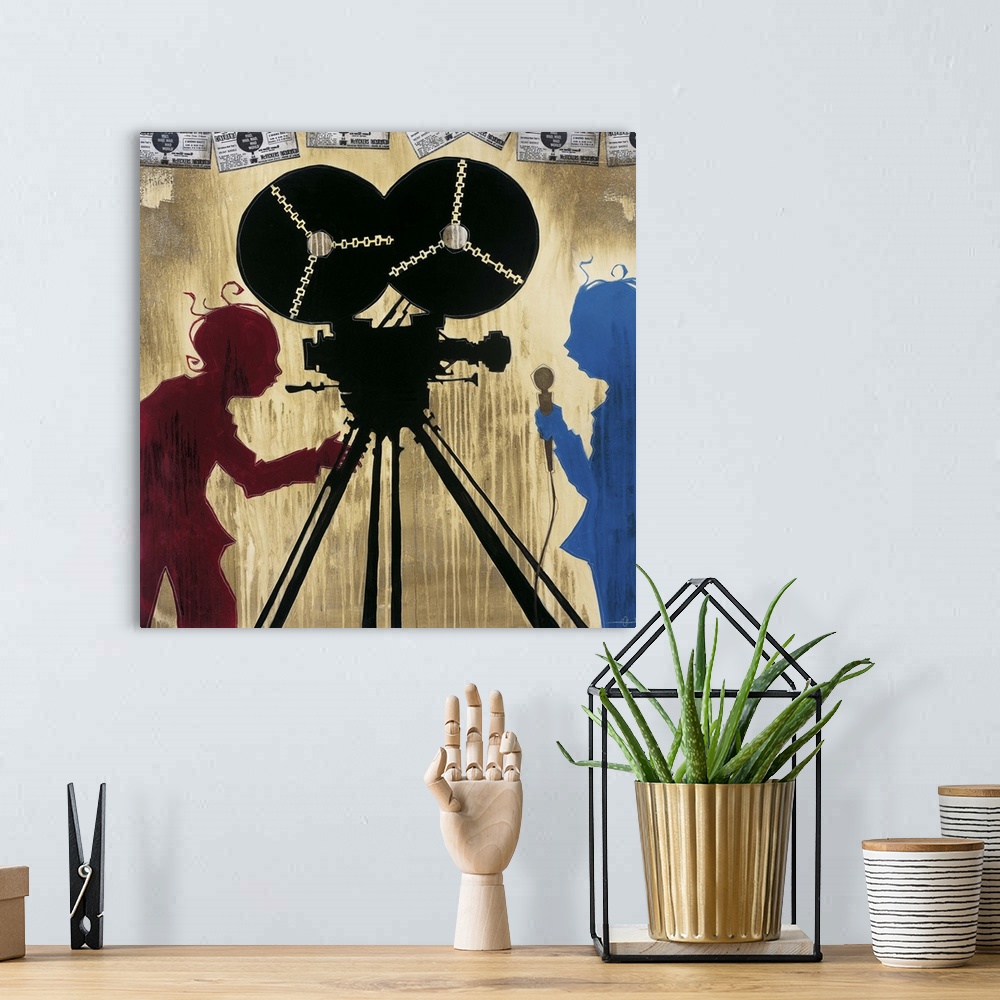 A bohemian room featuring A painting of a camera man in red silhouette pointing a camera at man in blue silhouette holding ...