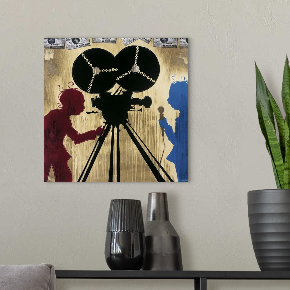 A modern room featuring A painting of a camera man in red silhouette pointing a camera at man in blue silhouette holding ...