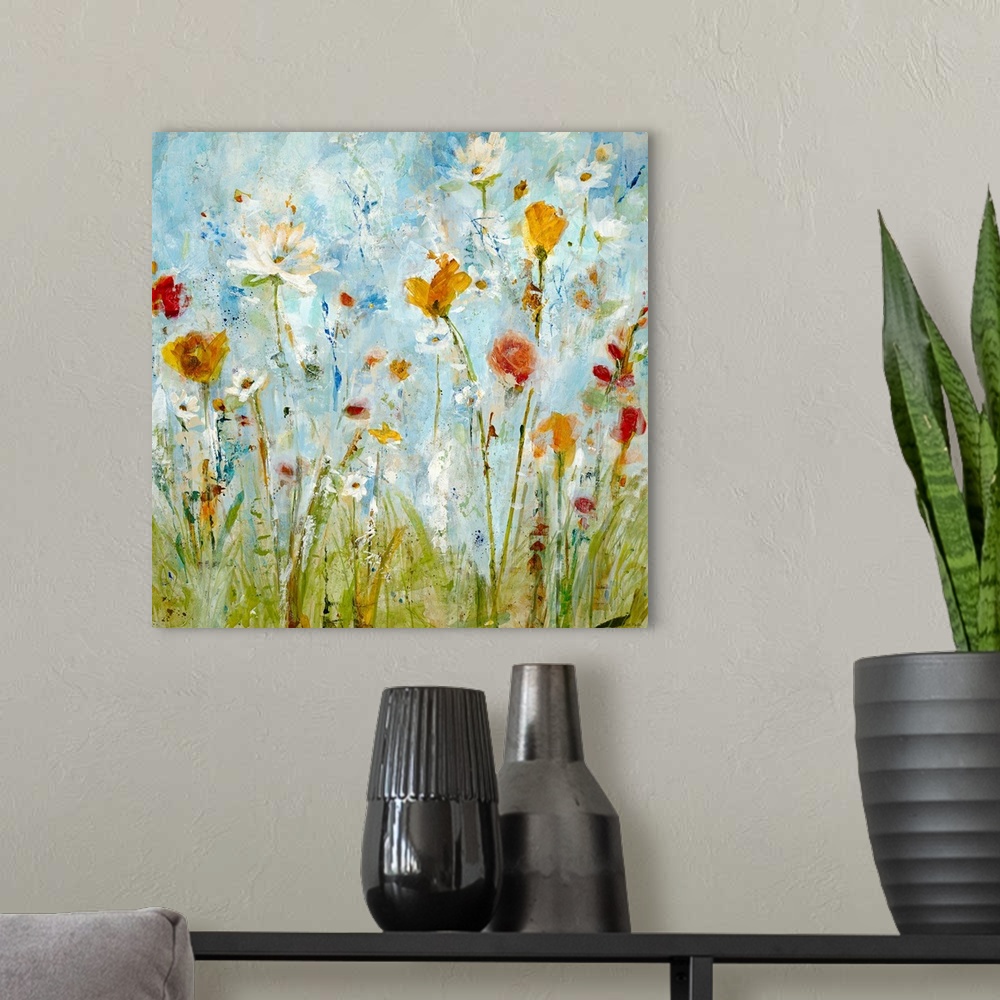 A modern room featuring A vertical abstract landscape painting of loosely painted flowers and grass that reminiscent of a...