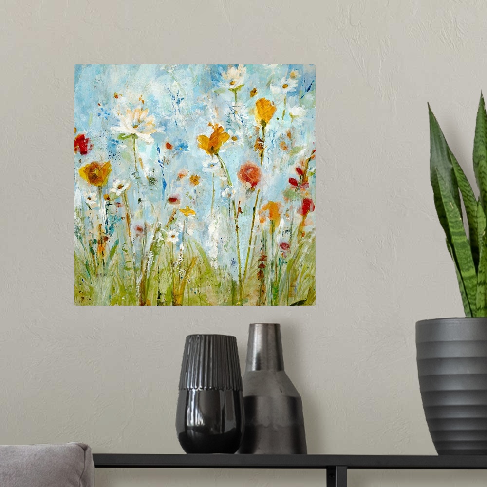 A modern room featuring A vertical abstract landscape painting of loosely painted flowers and grass that reminiscent of a...