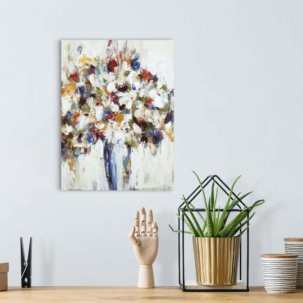 A bohemian room featuring Contemporary painting of a bouquet of flowers in vibrant colors.
