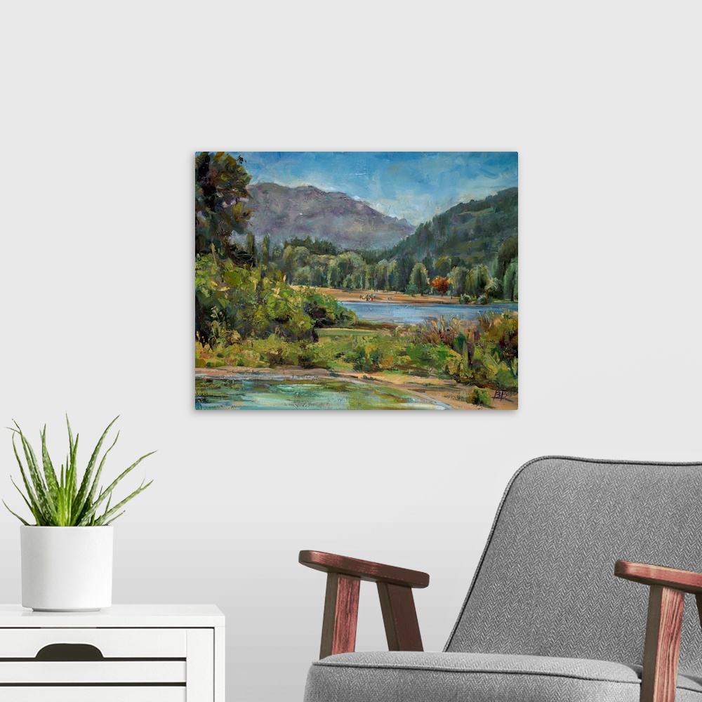A modern room featuring Contemporary landscape painting with a mountain in the background.
