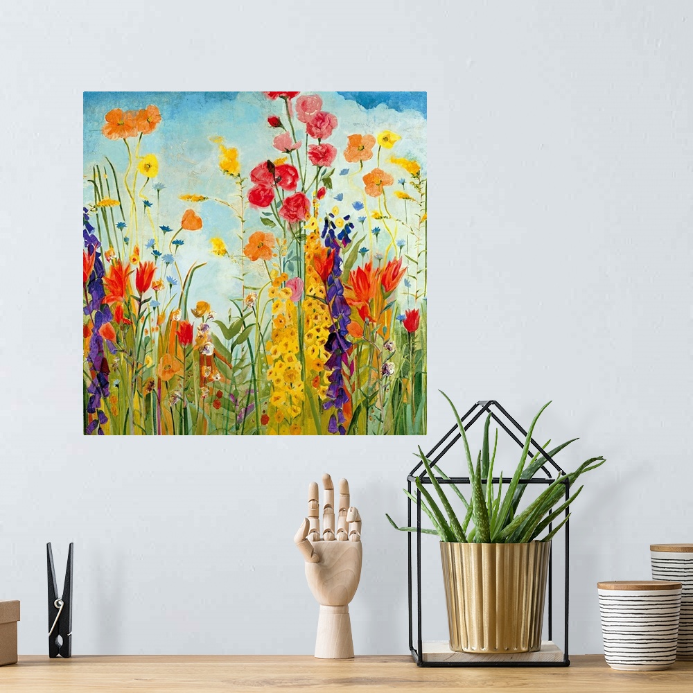 A bohemian room featuring A square, contemporary painting of a variety of flowers on a sunny day. Floral wall art perfect f...
