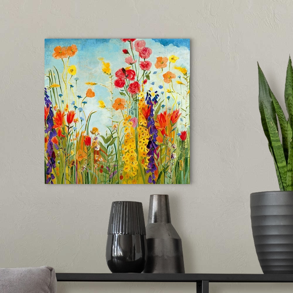 A modern room featuring A square, contemporary painting of a variety of flowers on a sunny day. Floral wall art perfect f...
