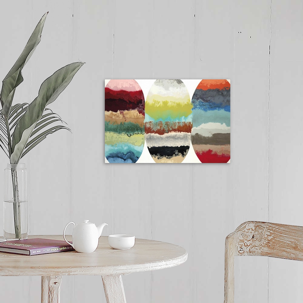 A farmhouse room featuring Contemporary abstract painting of three oblong oval shapes with multiple colors and textures in t...