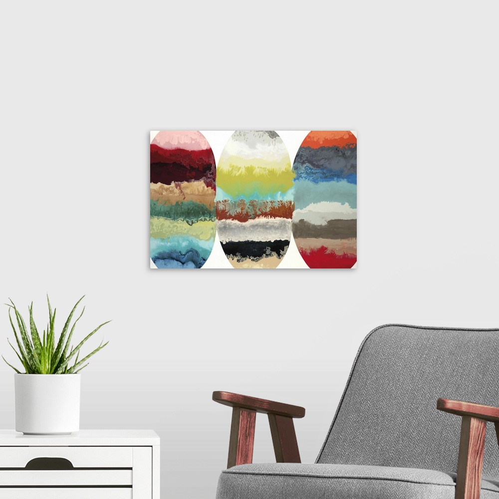 A modern room featuring Contemporary abstract painting of three oblong oval shapes with multiple colors and textures in t...