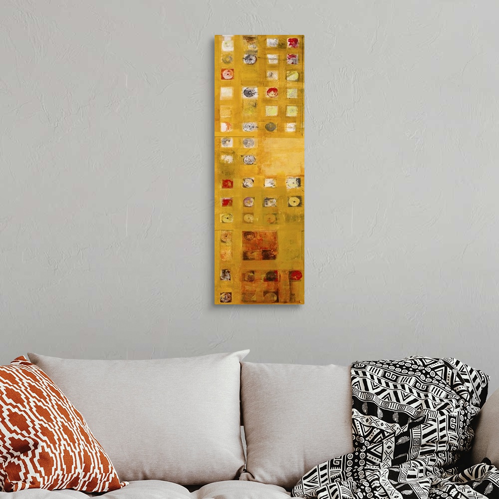 A bohemian room featuring Contemporary abstract painting using rich earth tons and geometric shapes.