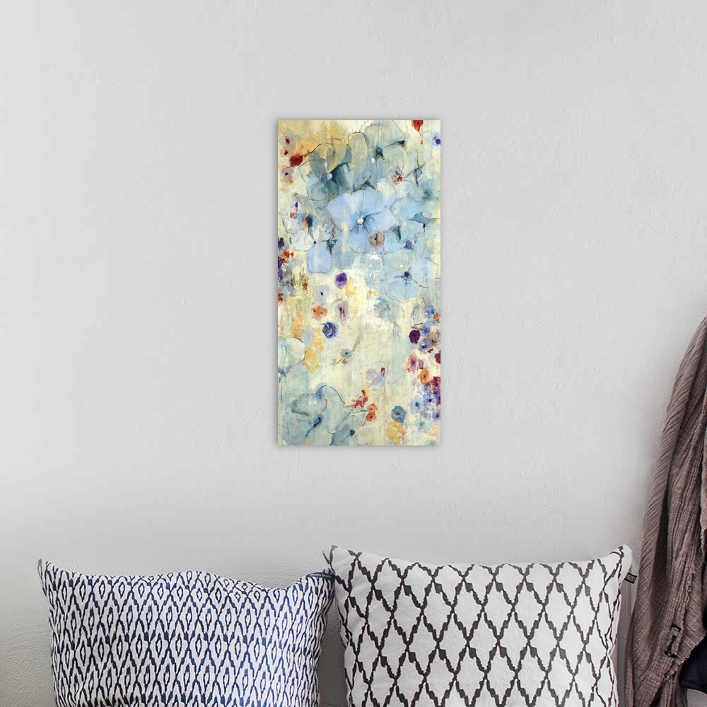 A bohemian room featuring A contemporary abstract painting using tones of blue with hints of purple.