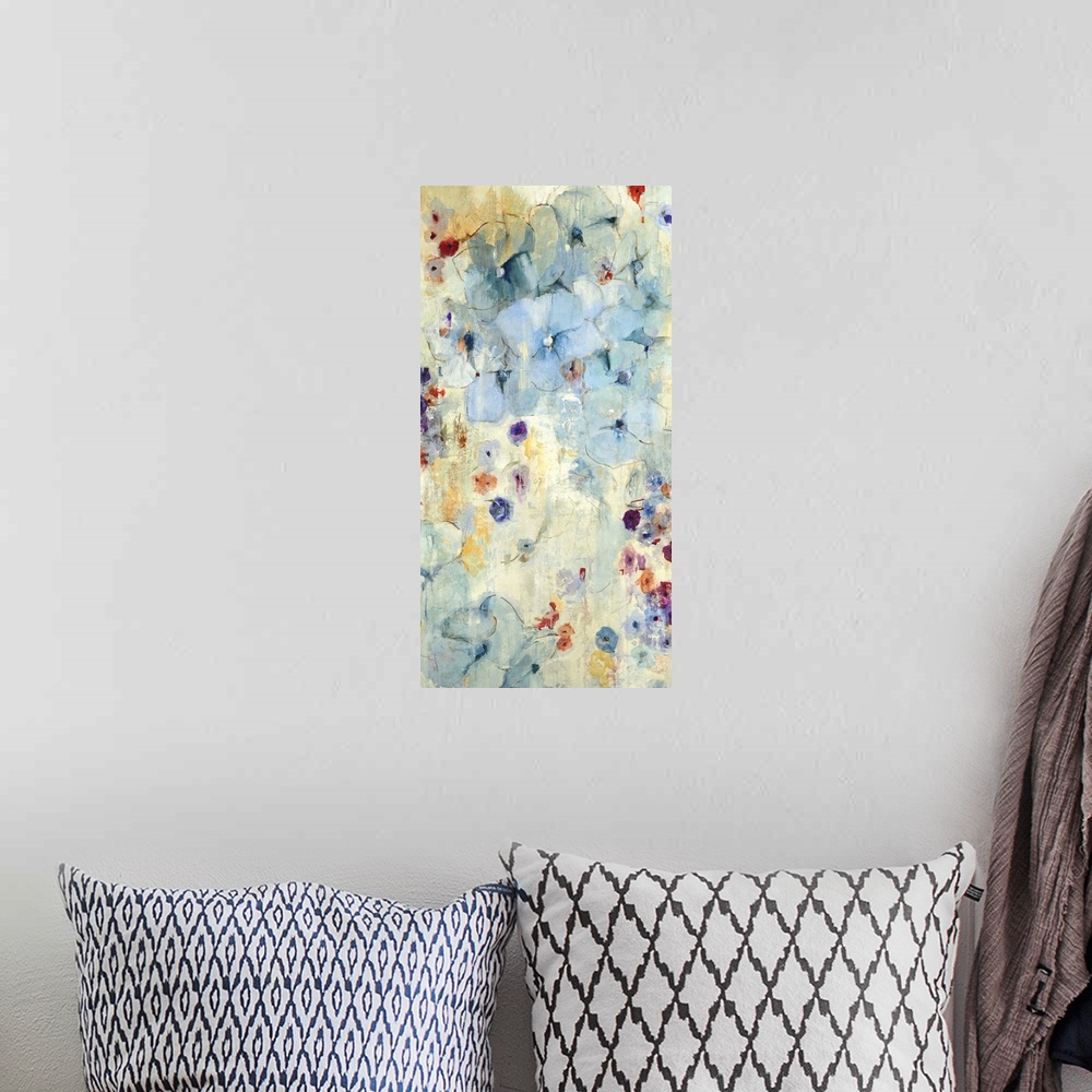A bohemian room featuring A contemporary abstract painting using tones of blue with hints of purple.