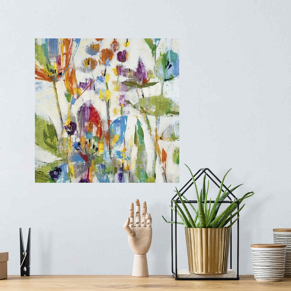 A bohemian room featuring Contemporary painting of multi-colored flowers.
