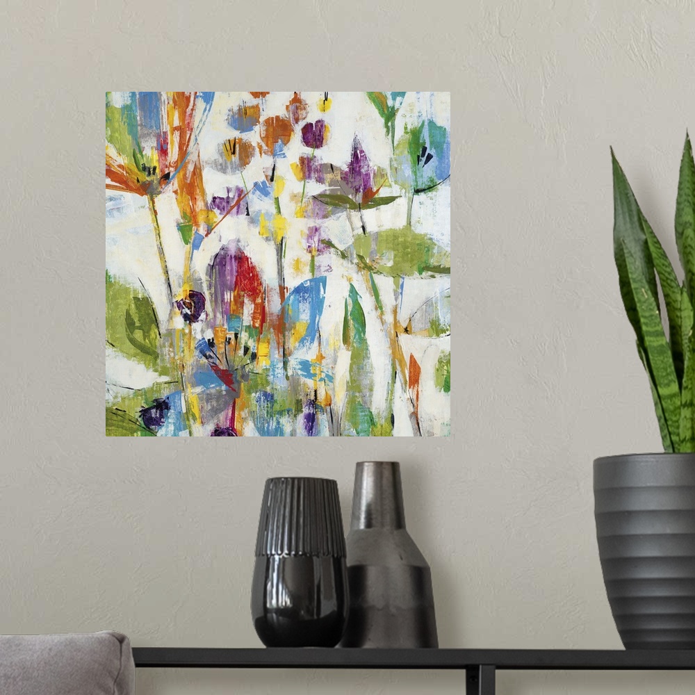 A modern room featuring Contemporary painting of multi-colored flowers.