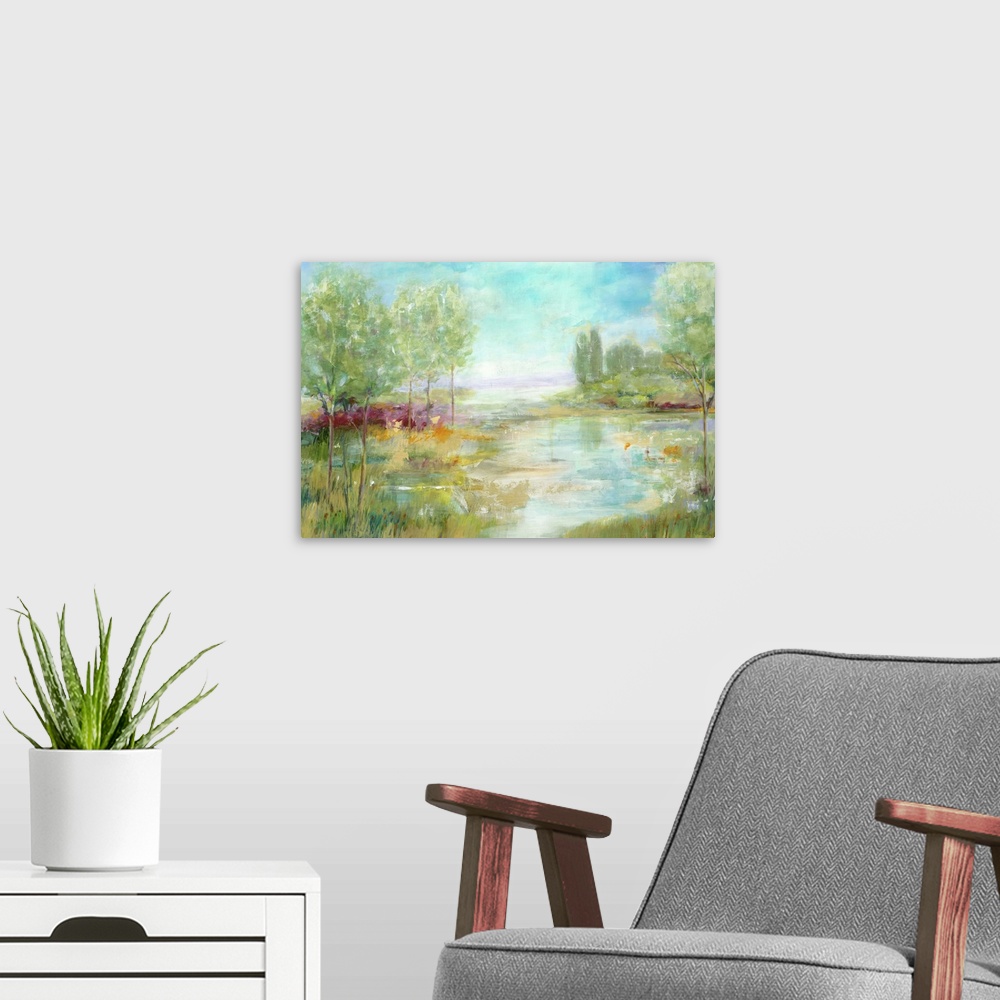 A modern room featuring Contemporary landscape painting looking out over lowlands surrounded by green foliage.