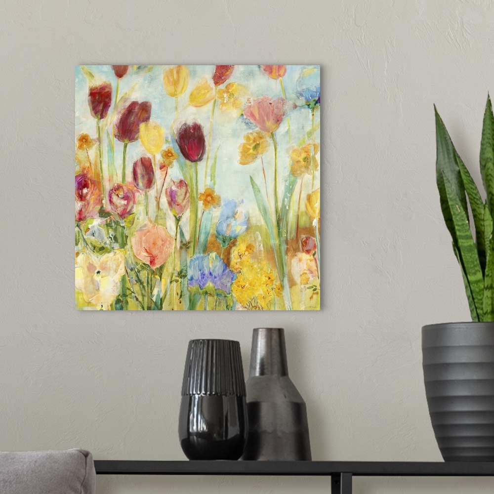 A modern room featuring A painting o vibrant garden flowers rising high on bright green stems.