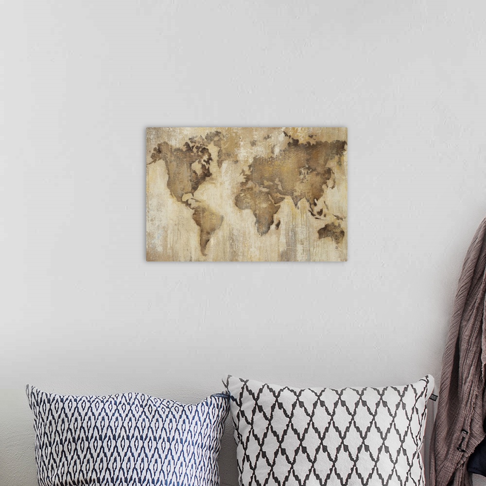 A bohemian room featuring Home decor artwork of a weathered looking world map.