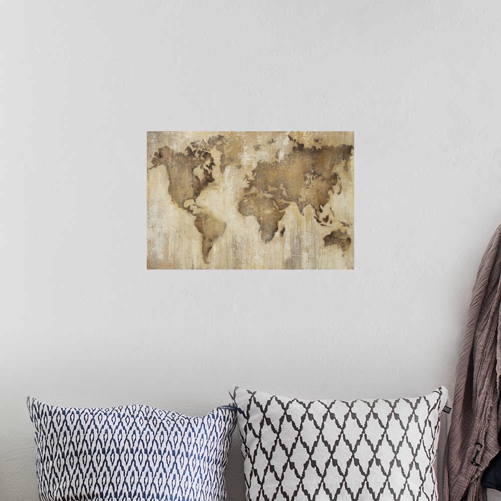A bohemian room featuring Home decor artwork of a weathered looking world map.