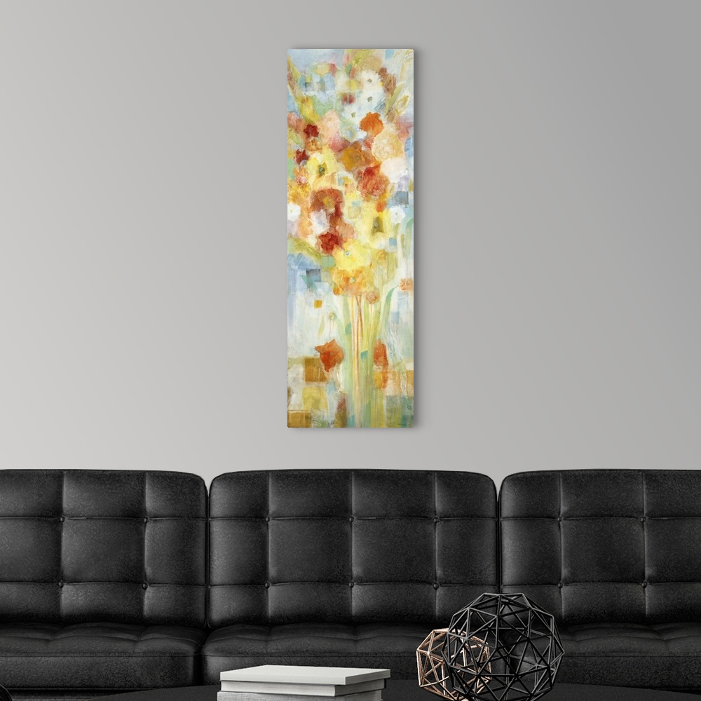 A modern room featuring A contemporary painting of flowers in red orange and yellow tones.