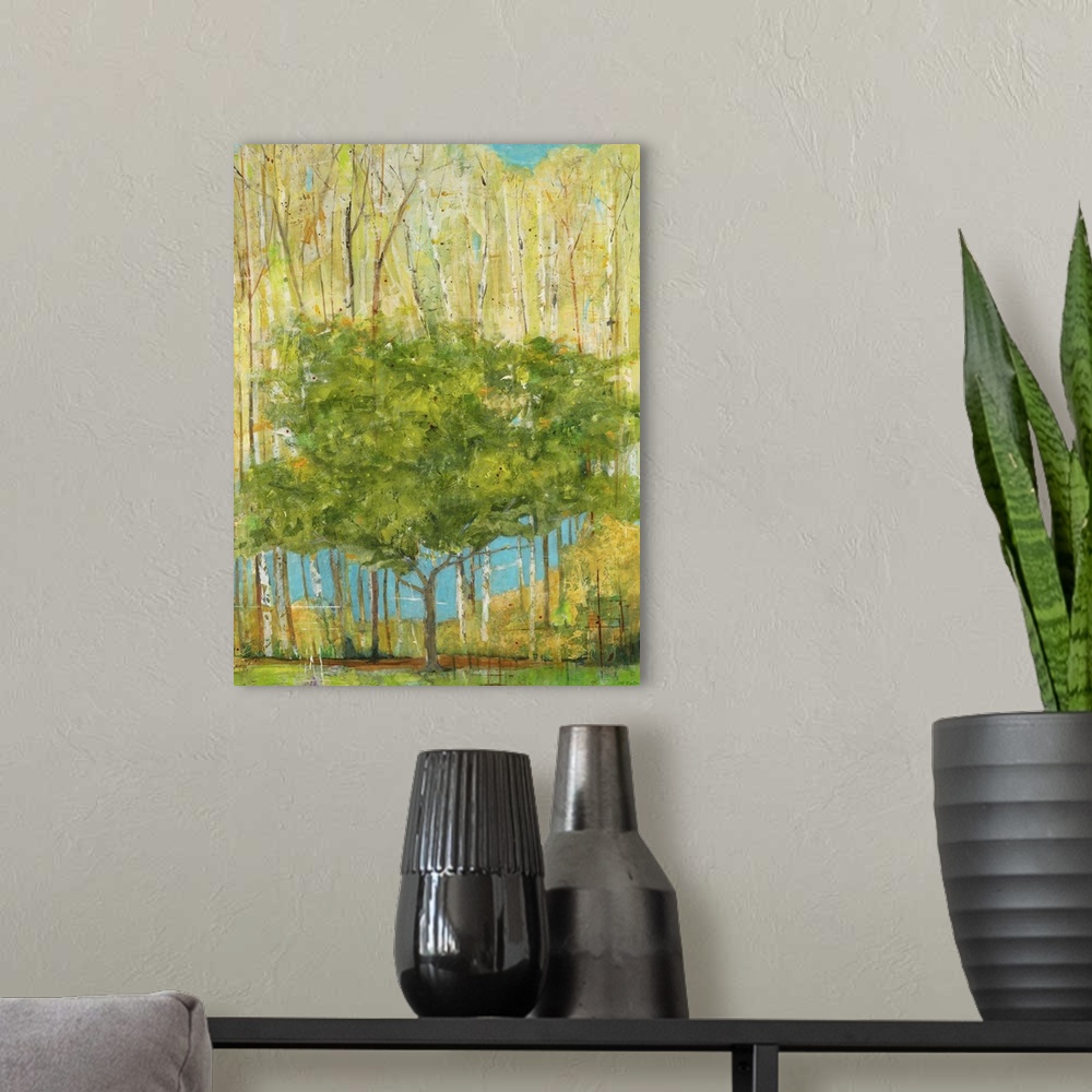 A modern room featuring Contemporary painting of a single green tree dwarfed by taller trees with pale foliage.