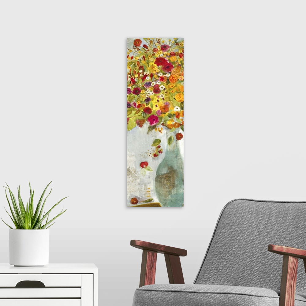 A modern room featuring A contemporary painting of a pale blue vase holding flowers in red orange and yellow tones.