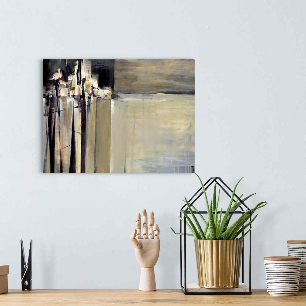 A bohemian room featuring Abstract painting using cool colors and earth tones creating what looks like a city skyline.