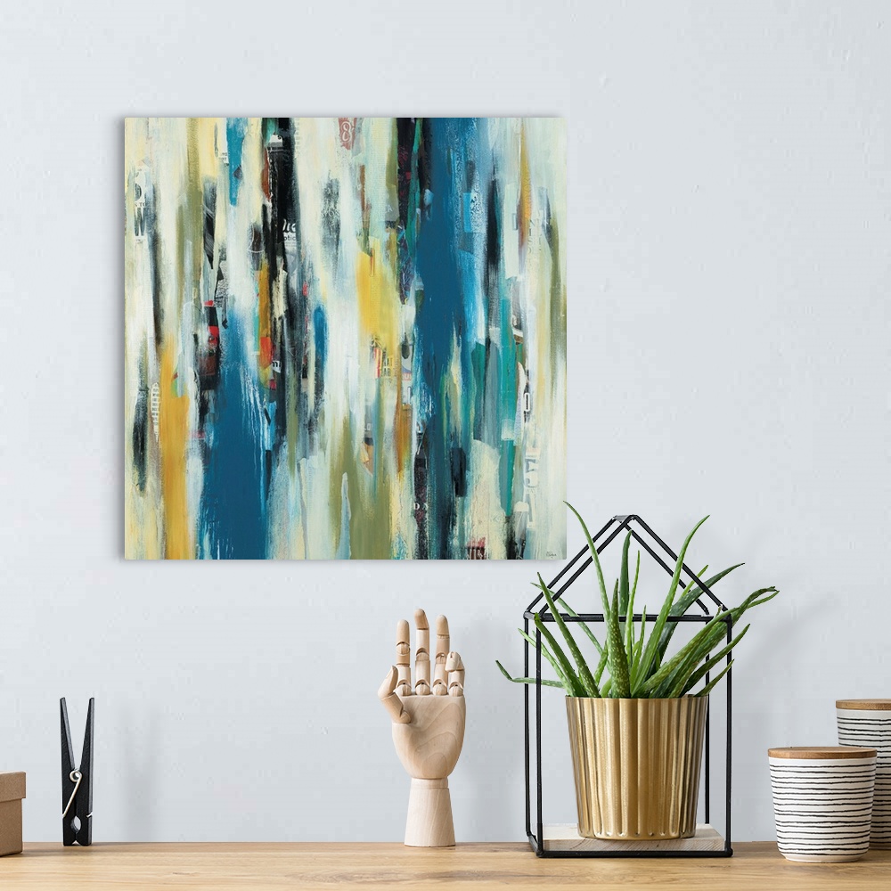 A bohemian room featuring Contemporary abstract painting using a a color palette of a blue yellow and green tones in vertic...