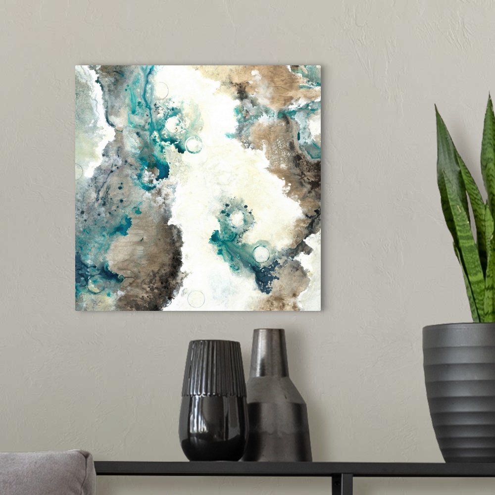 A modern room featuring Square abstract painting with marbling colors in shades of brown, gray, cream, and blue.