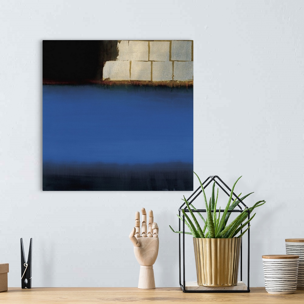 A bohemian room featuring Contemporary abstract painting using deep blue to make what almost looks like an ocean.