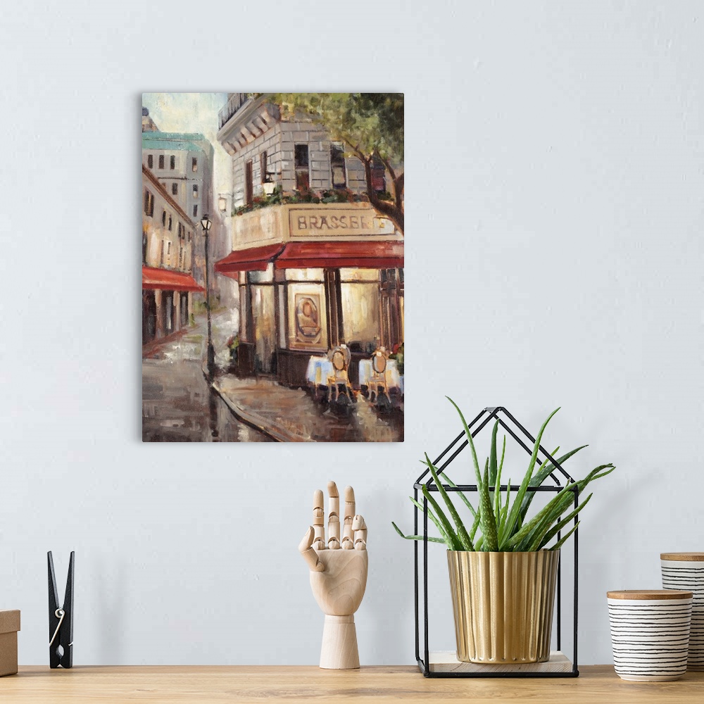 A bohemian room featuring Painting of a Parisian street cafe scene.