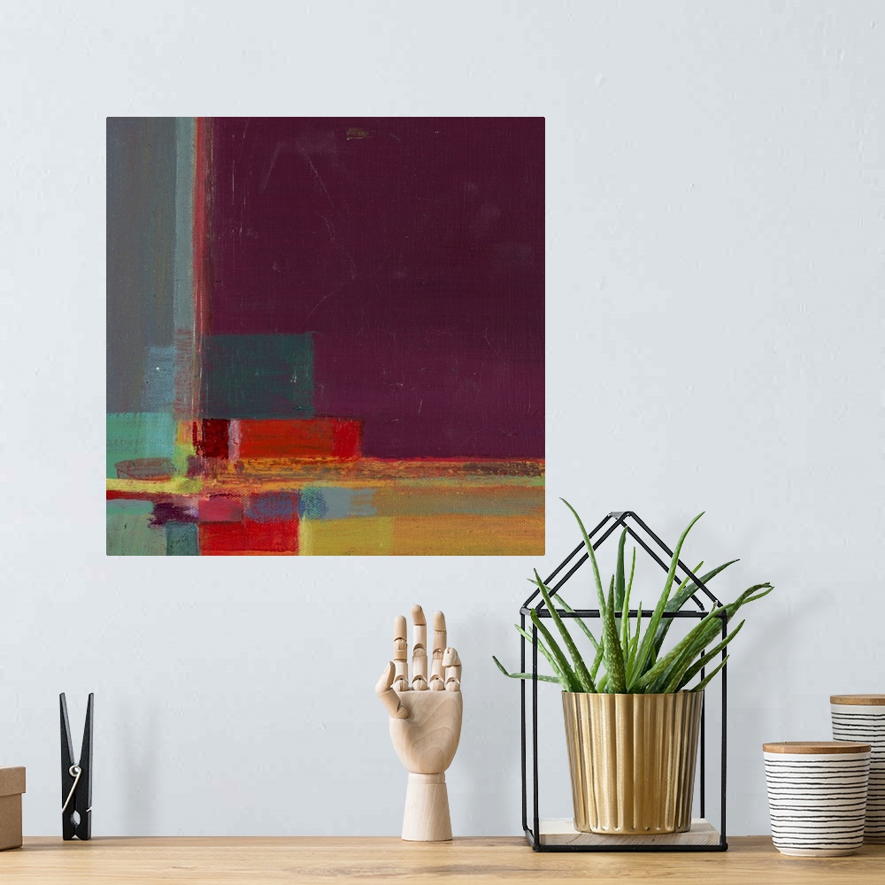 A bohemian room featuring Contemporary abstract painting of colorful geometric shapes overlapping one another.