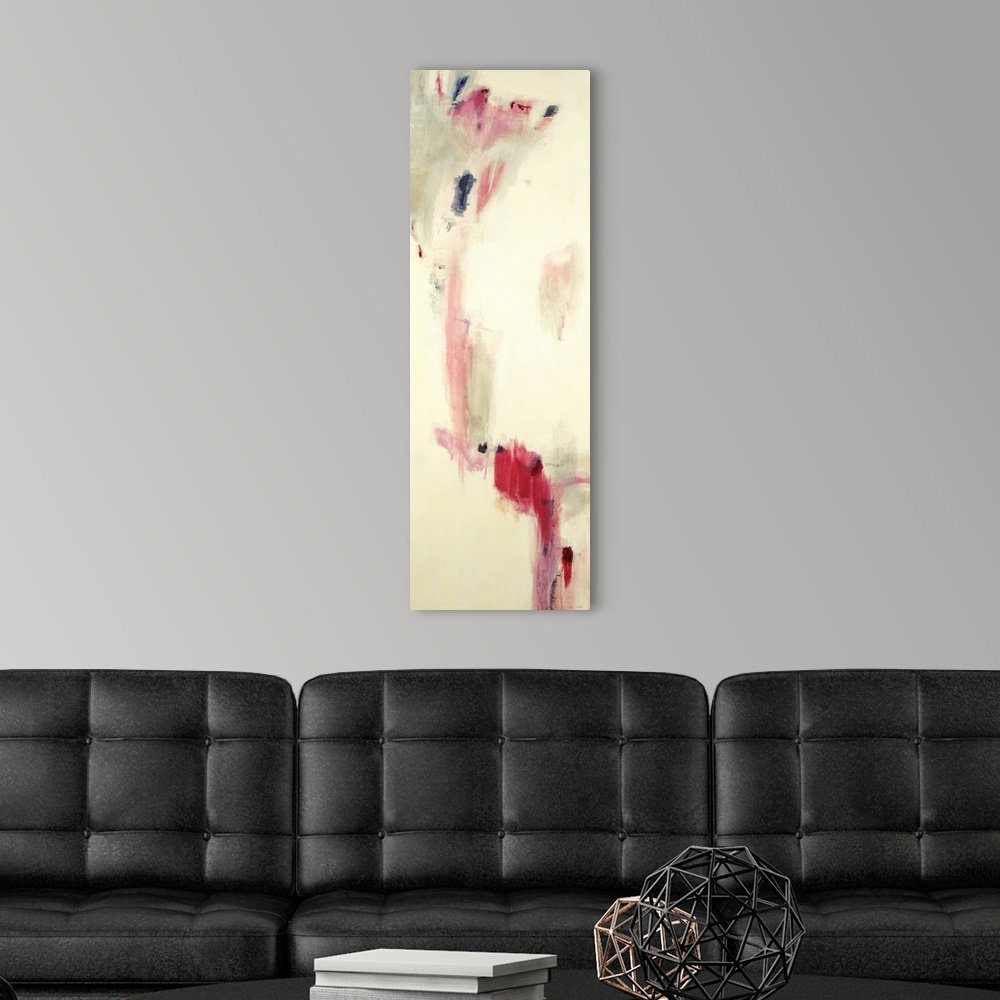 A modern room featuring Contemporary abstract painting using splashes of pink against a beige background.