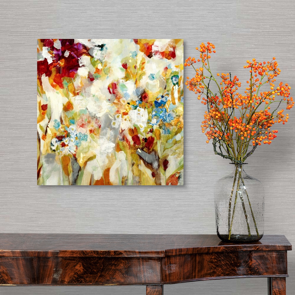 A traditional room featuring An abstract piece that has a variety of colors painted loosely to resemble flowers.