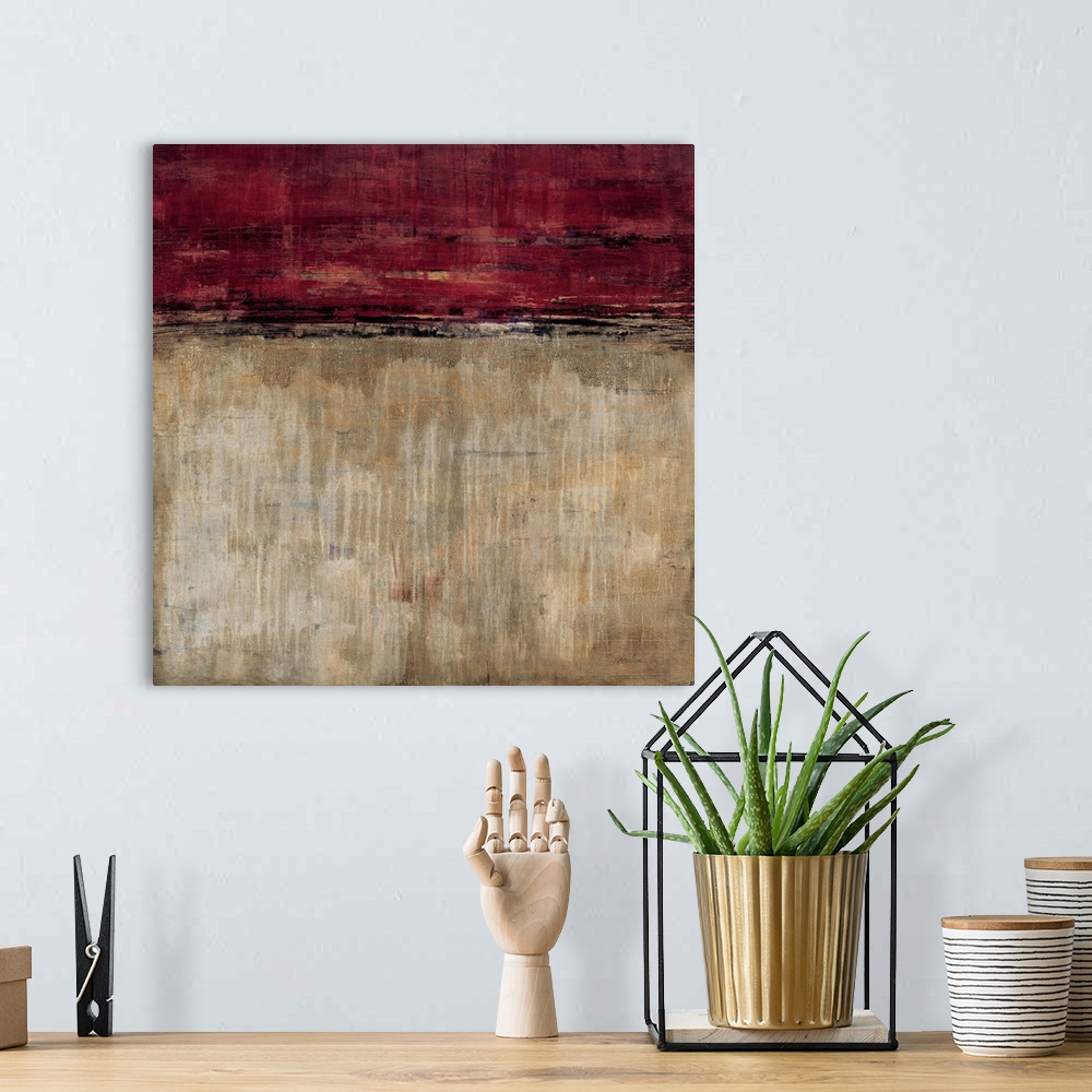 A bohemian room featuring Contemporary abstract painting using earth tones and dark red to make a color field.