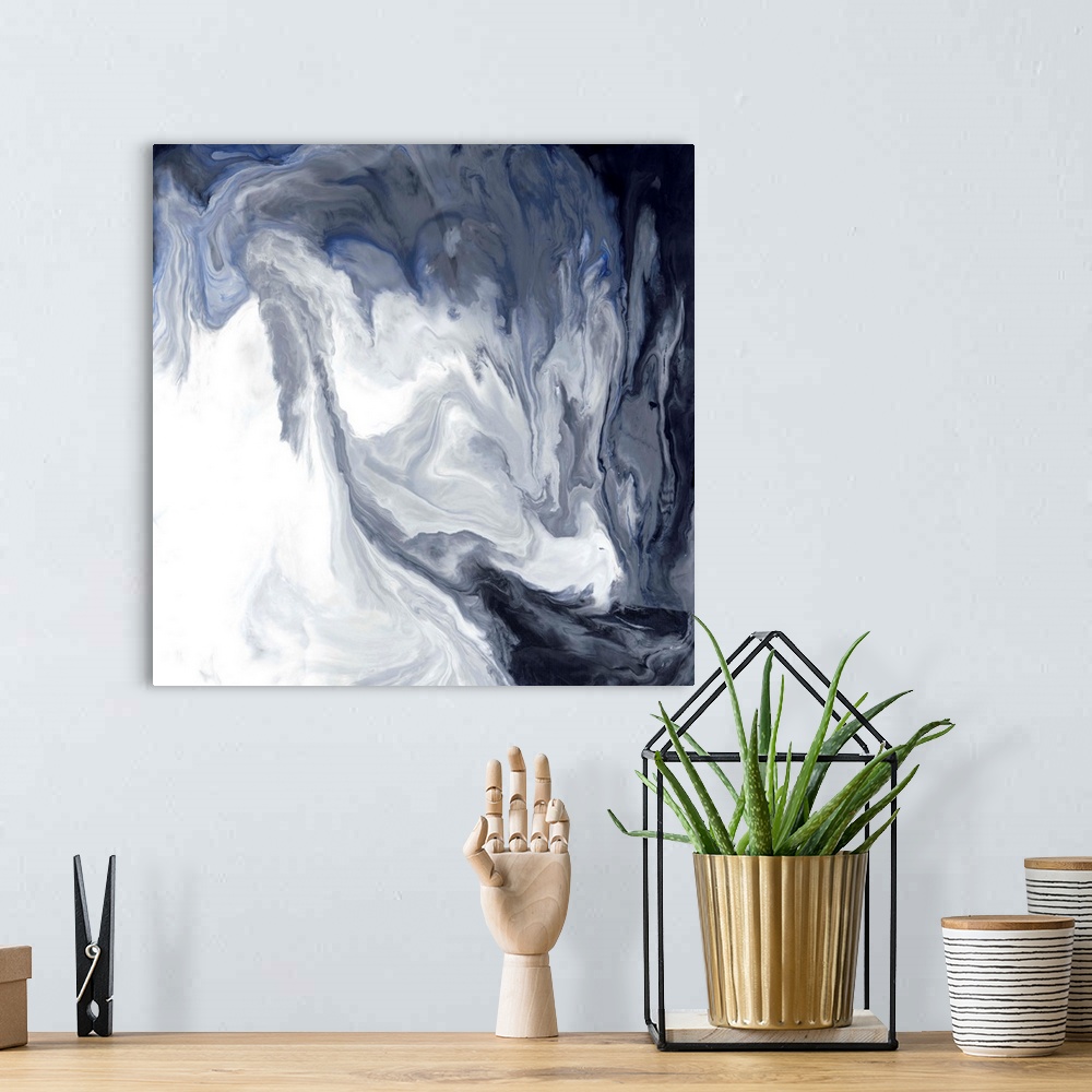 A bohemian room featuring Gray, white, blue, and black hues marbling together on a square canvas.