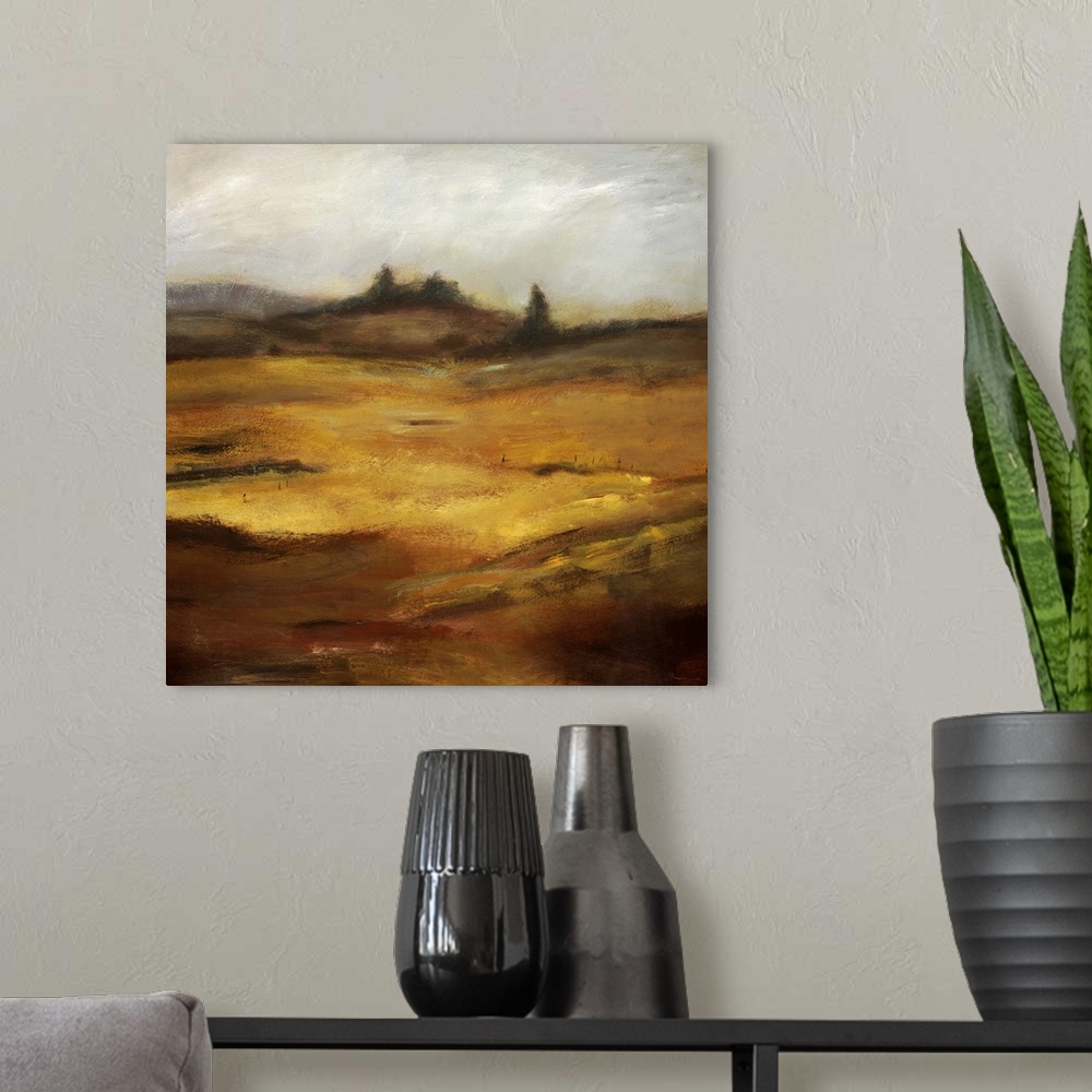 A modern room featuring Contemporary abstracted landscape painting using muted earthy tones.