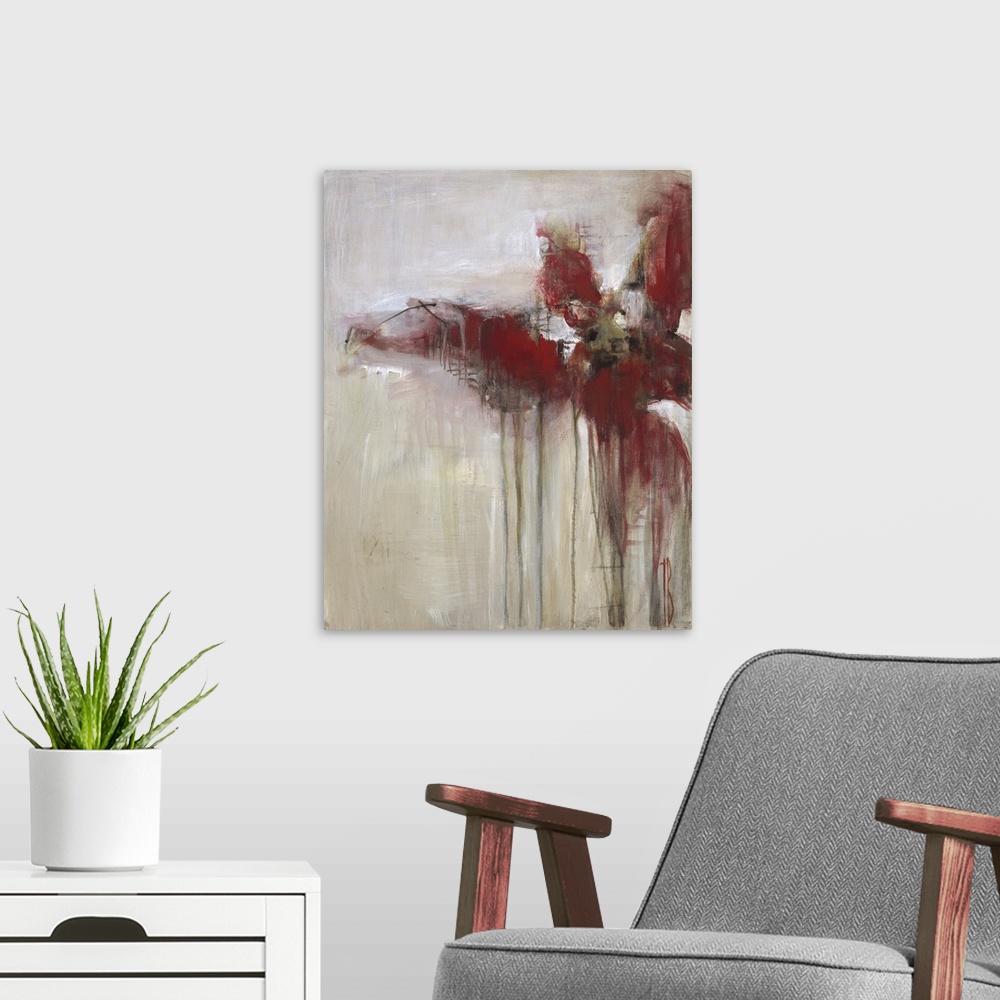 A modern room featuring Contemporary abstract painting using deep red tones dripping against a neutral toned background.