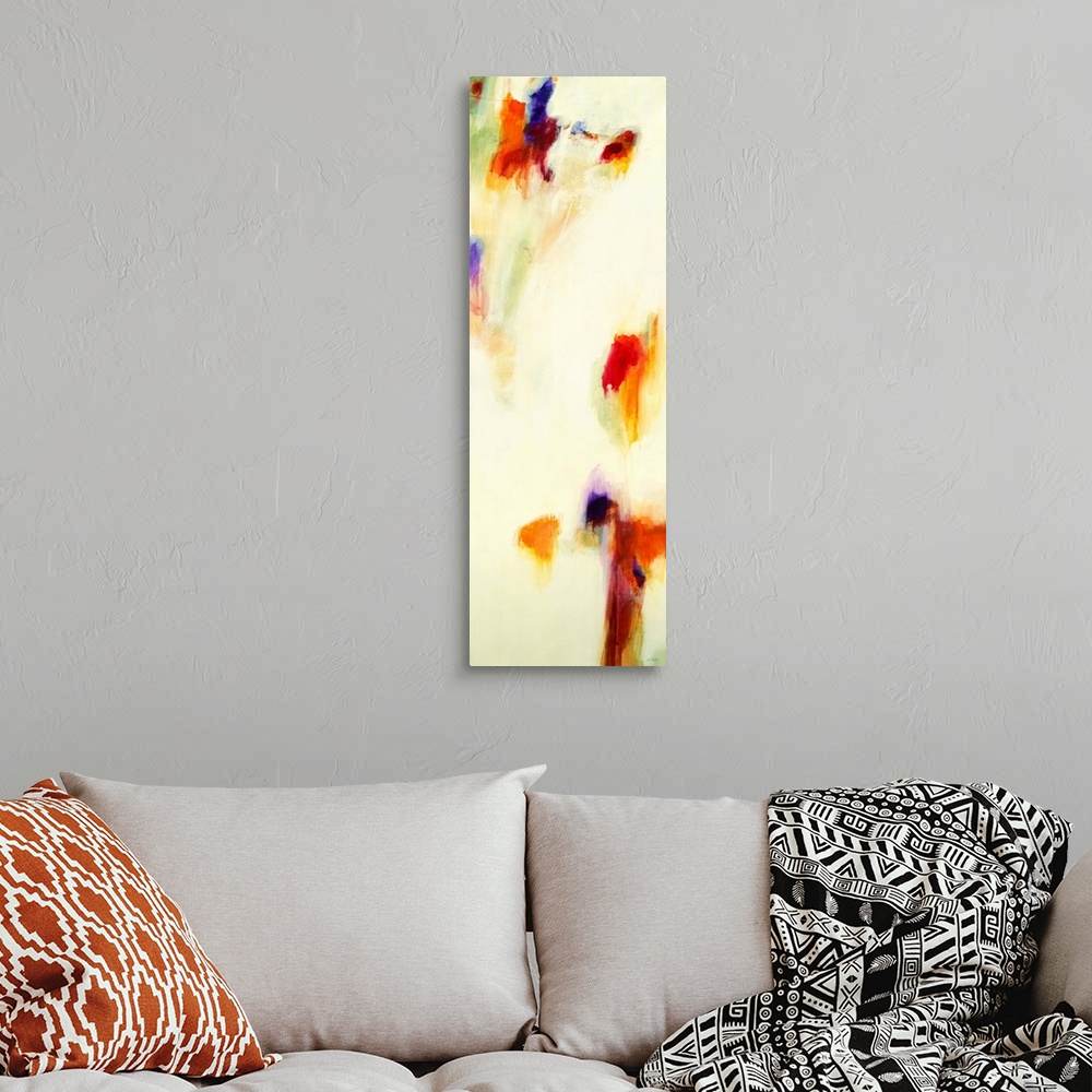 A bohemian room featuring Contemporary abstract painting using splashes of red and orange  against a beige background.