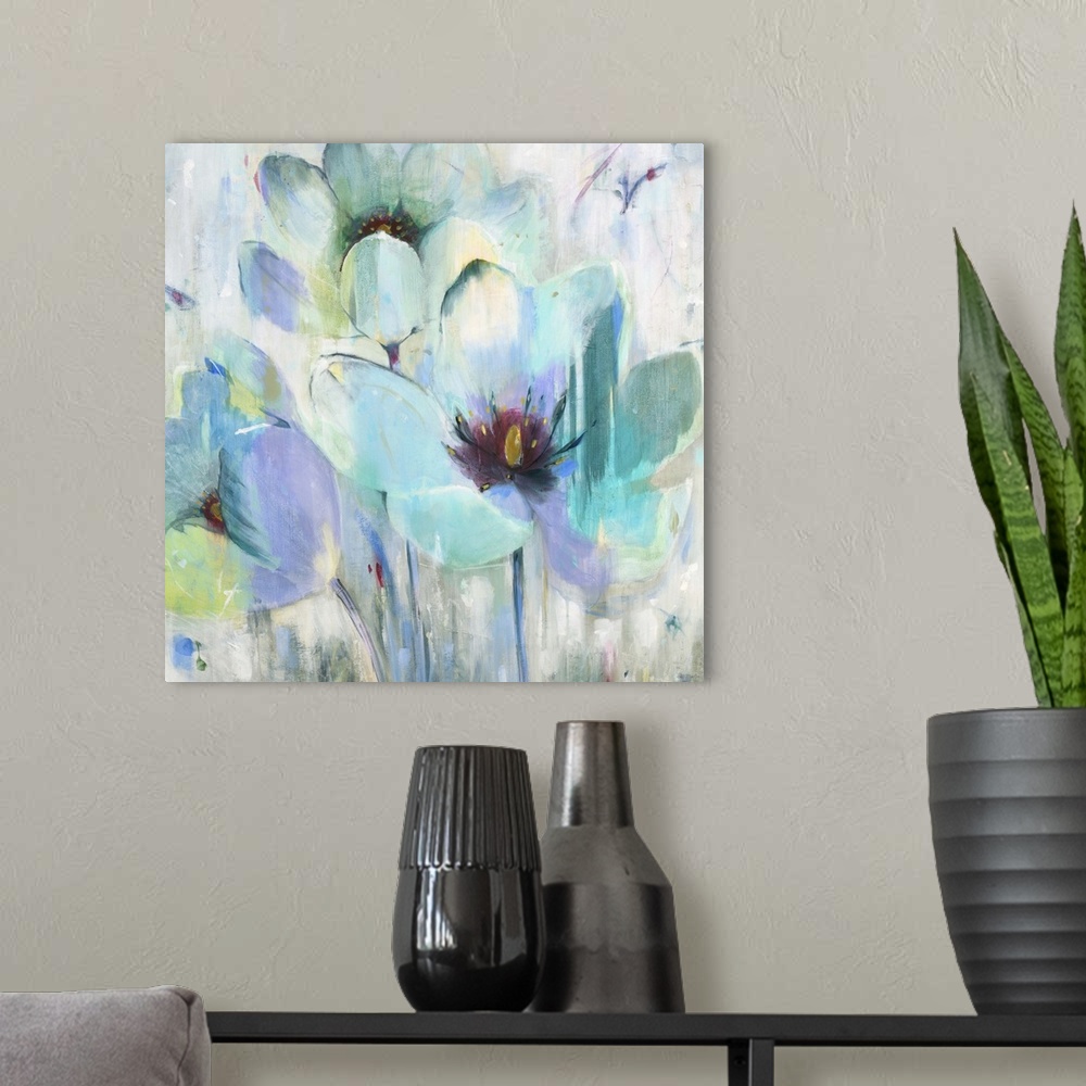 A modern room featuring A contemporary painting of aqua blue and teal flowers against an abstract colorful background.