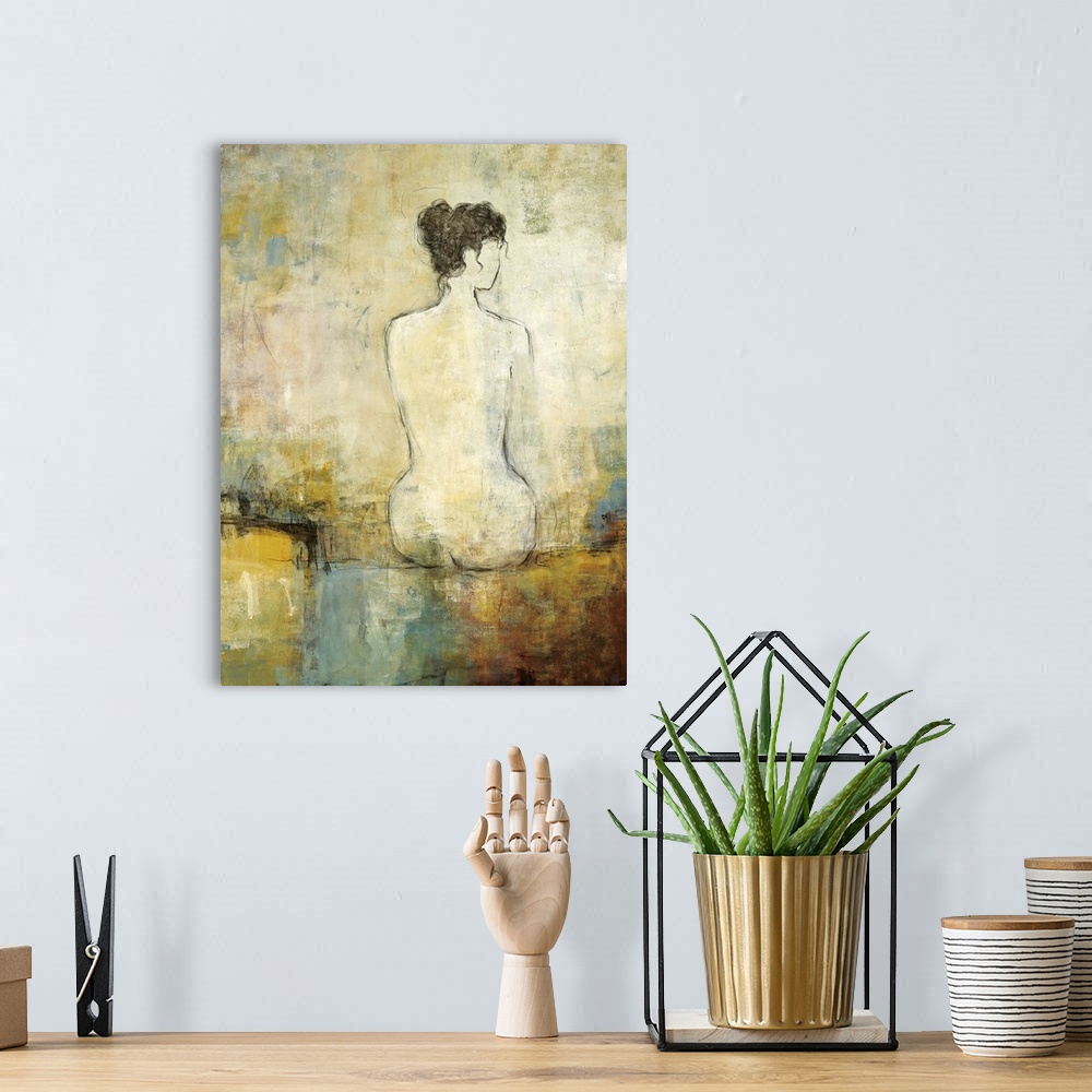 A bohemian room featuring Contemporary painting of woman's silhouette from behind that is sitting on a surface.