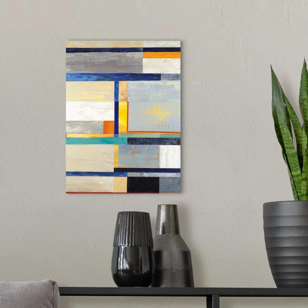 A modern room featuring A contemporary abstract painting using colorful geometric forms.