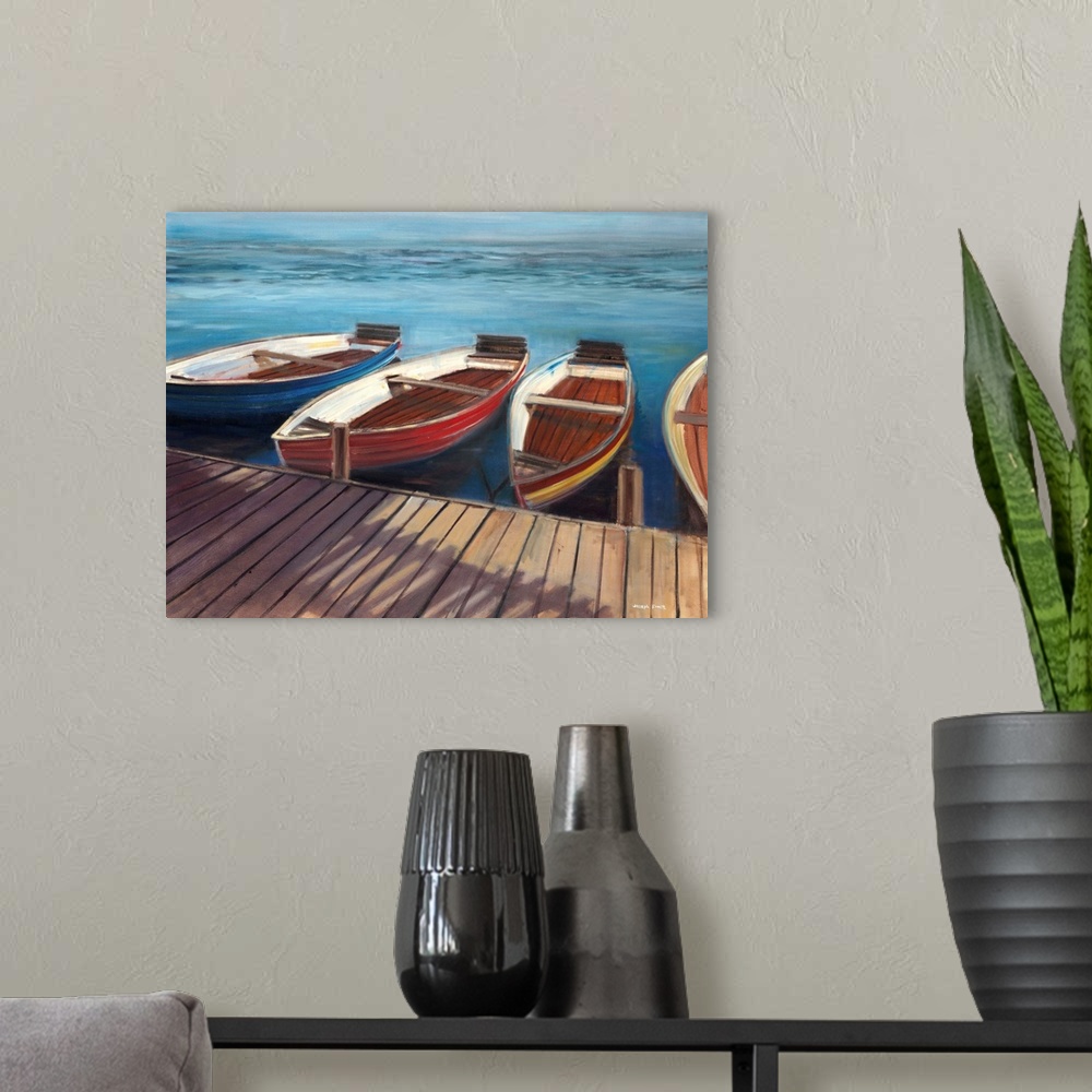 A modern room featuring Contemporary painting of wooden row boats lined up behind a wooden dock.