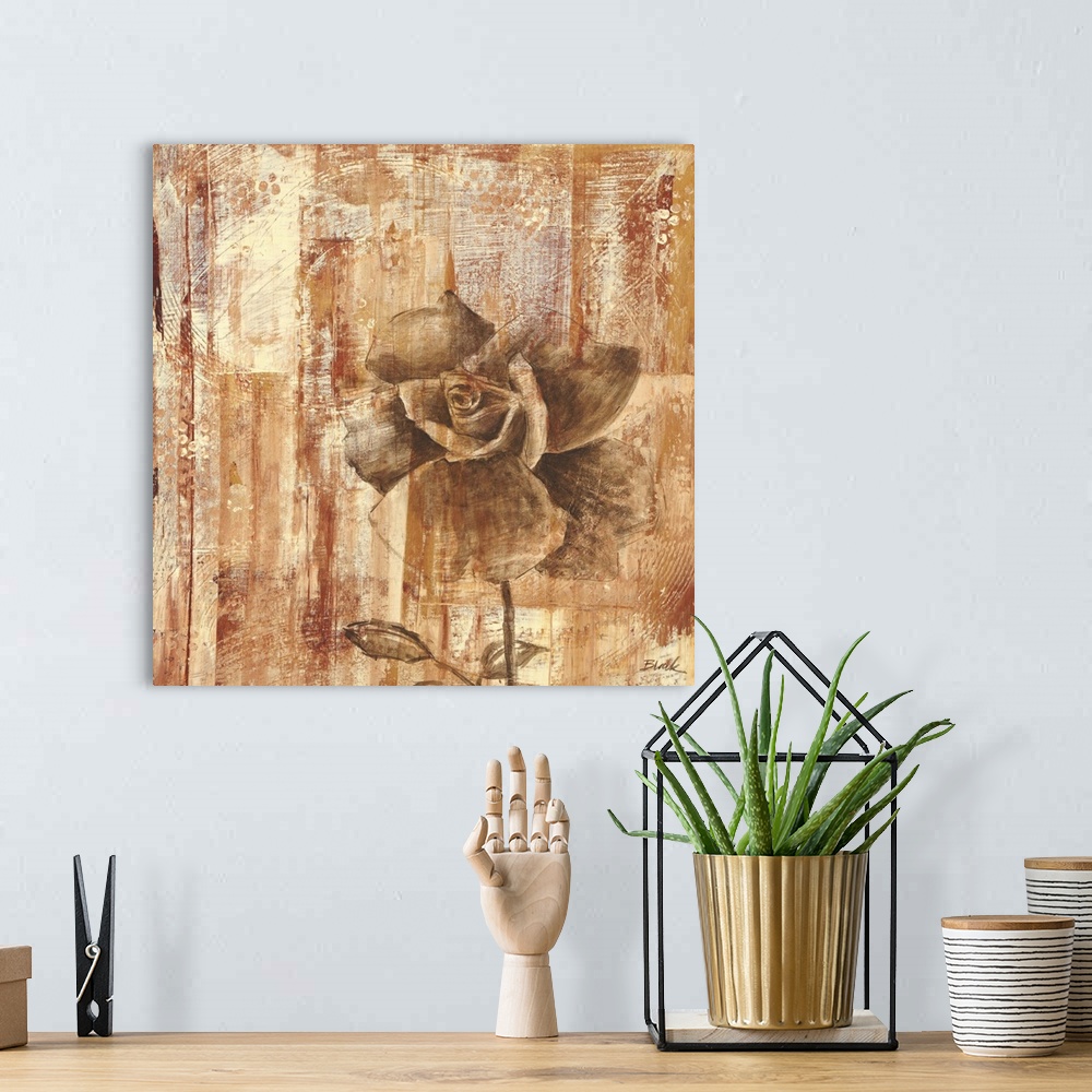 A bohemian room featuring A contemporary painting of a bronze rose against a weathered bronze background.